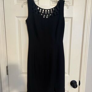 Classic Black Sleeveless Dress with Ladder Neckline